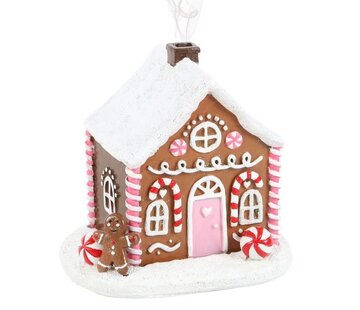Roze peperkoekenhuis wierook kegelbrander