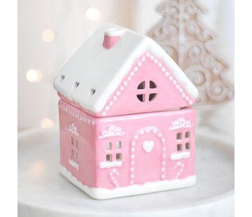 Roze peperkoekenhuis oliebrander