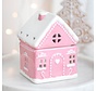 Roze peperkoekenhuis oliebrander