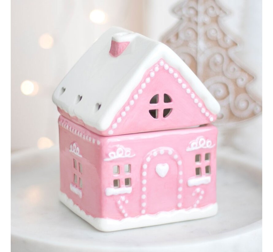 Roze peperkoekenhuis oliebrander
