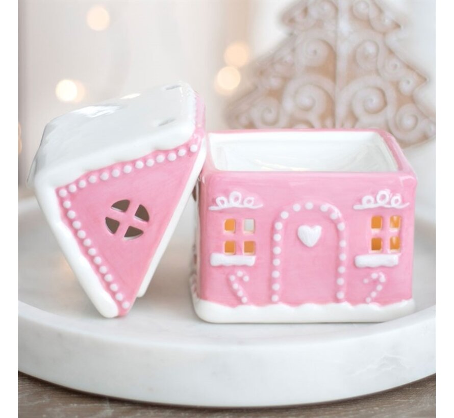 Roze peperkoekenhuis oliebrander