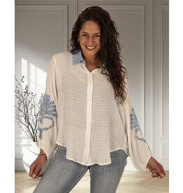 Witte blouse  jeans bloem
