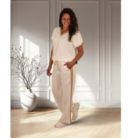 Ecru jogpantalon met gouden bies