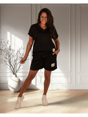 Zwart joggingpak kort