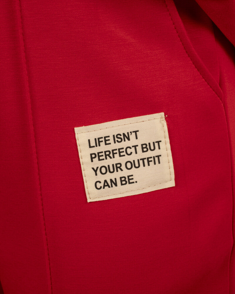 Rood joggingpak lang van El-Vita