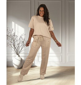 Beige joggingpak lang