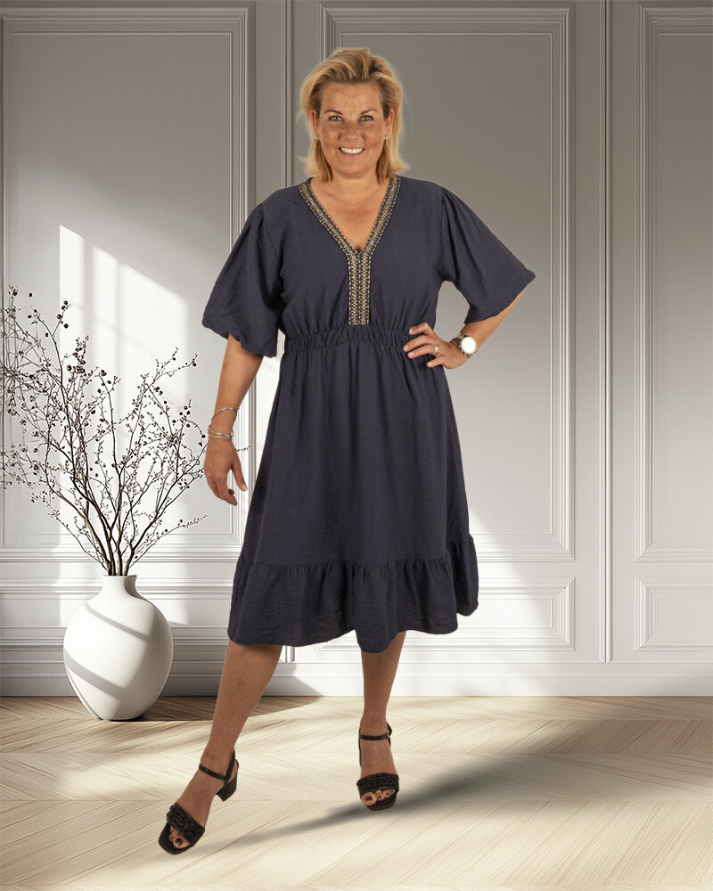 Donkerblauwe jurk pofmouw van New Collection