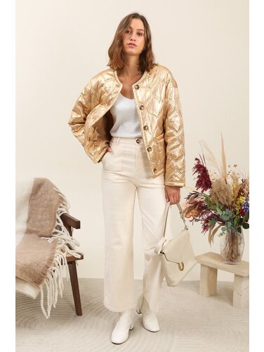 Gewatteerde goudkleurige jasje