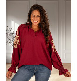 Gemma Ricceri Bordeaux blouse met gouden mouw applicatie