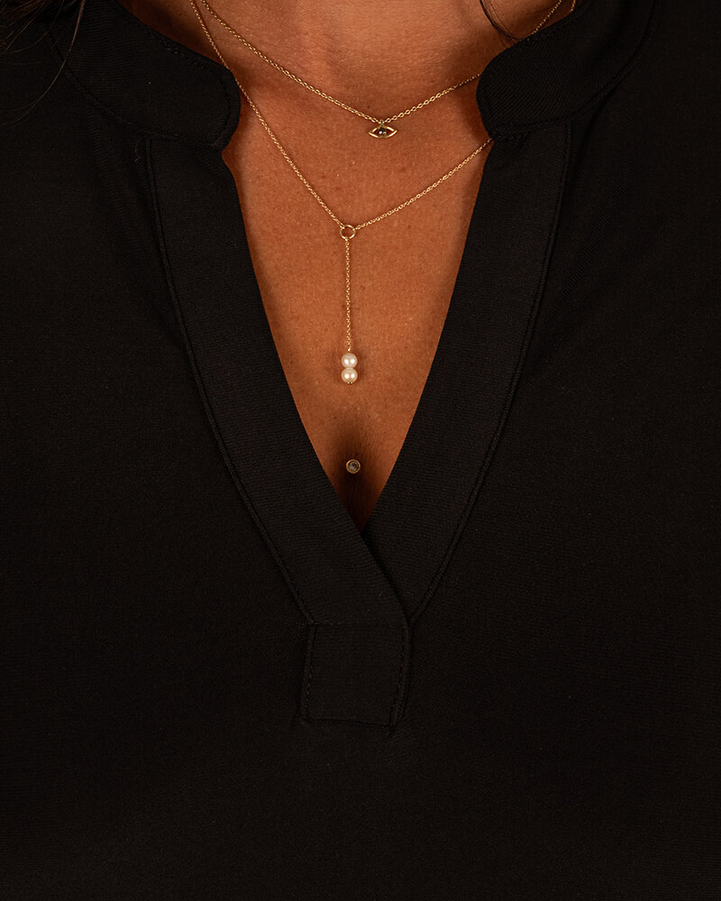 Zwarte travelstof jurk/tuniek van Angelle Milan