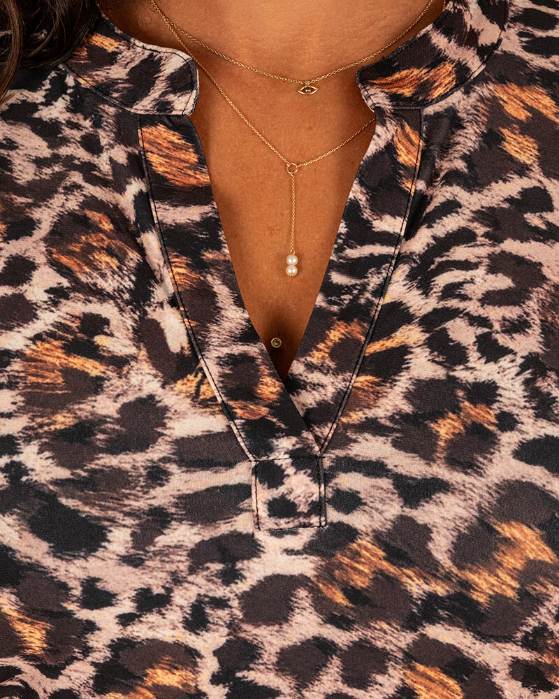 Beige/zwart panterprint travelstof jurk/tuniek van Angelle Milan