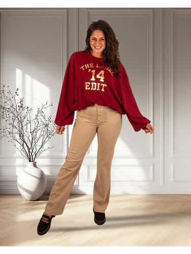 Beige wide leg jeans met knopen