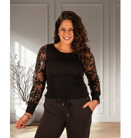 Zwarte trui mesh mouwen pailletten