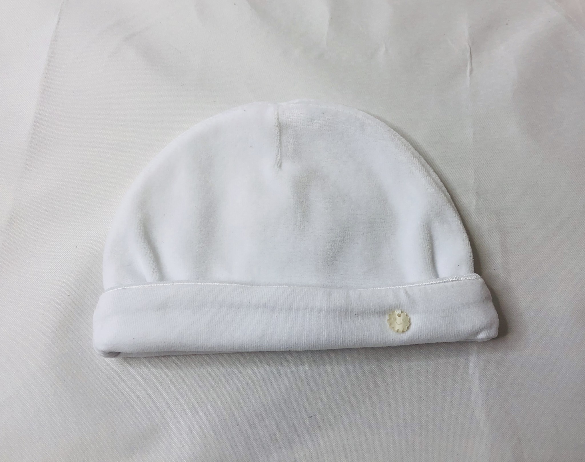 white newborn cap