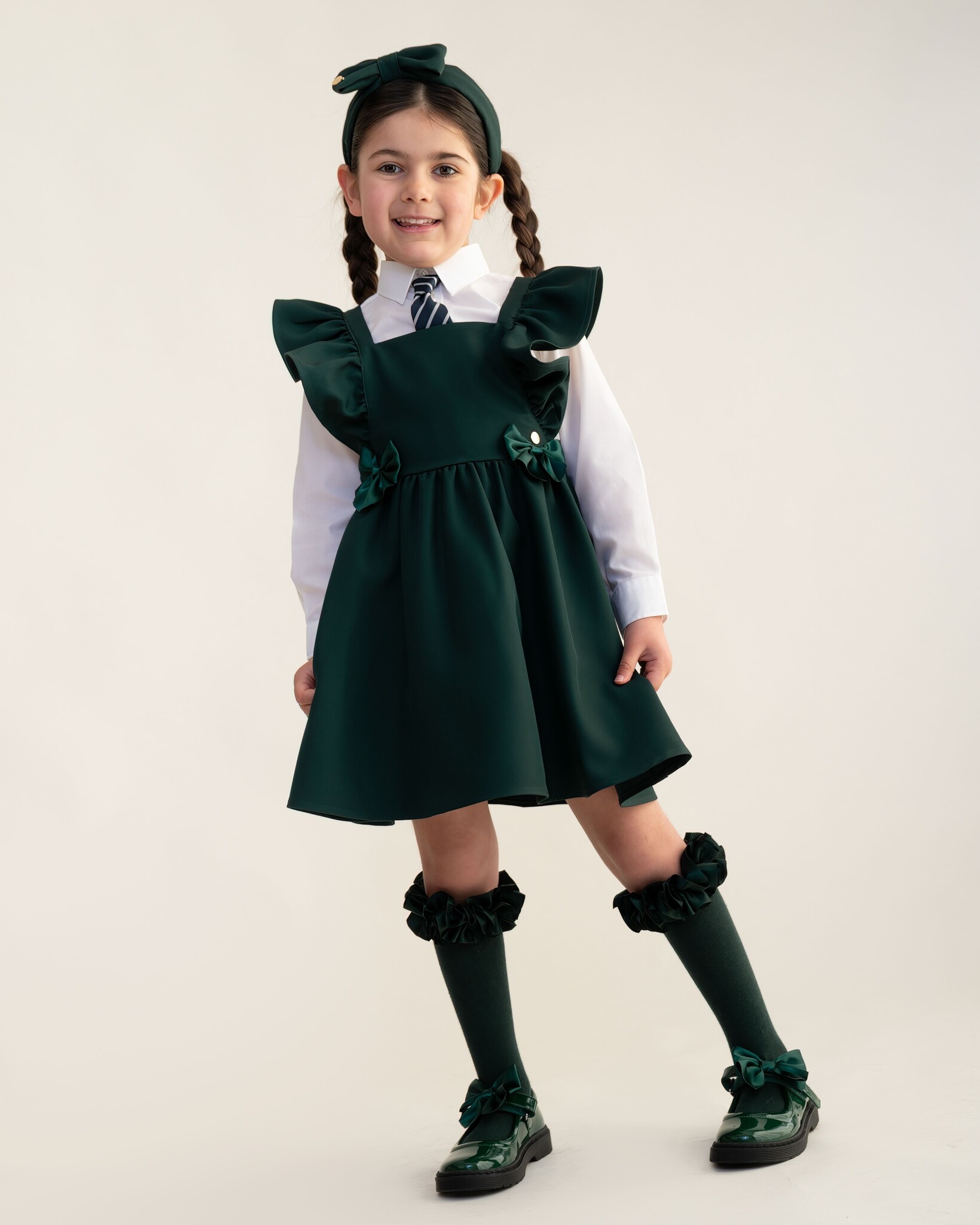 Caramelo BTS25 Flared Pinafore with Bow - 342142 - Bubbles Childrenswear Caramelo BTS25 Flared Pinafore with Bow - 342142 - Bubbles Childrenswear