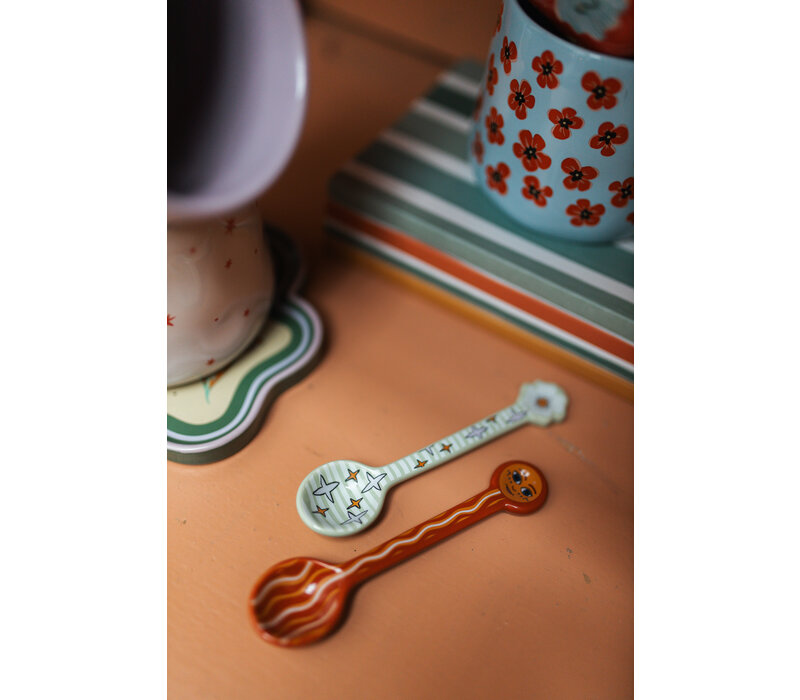 Lepel met Witte Bloem en Sterren