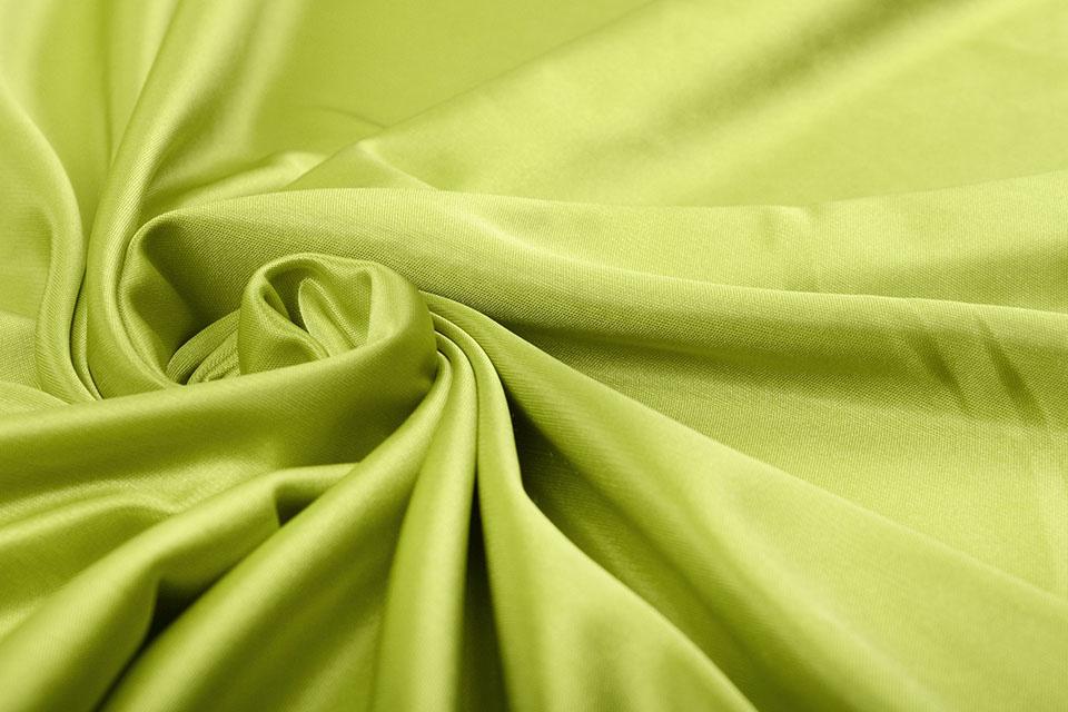 Charmeuse Lining Lime - Boelens Modestoffen