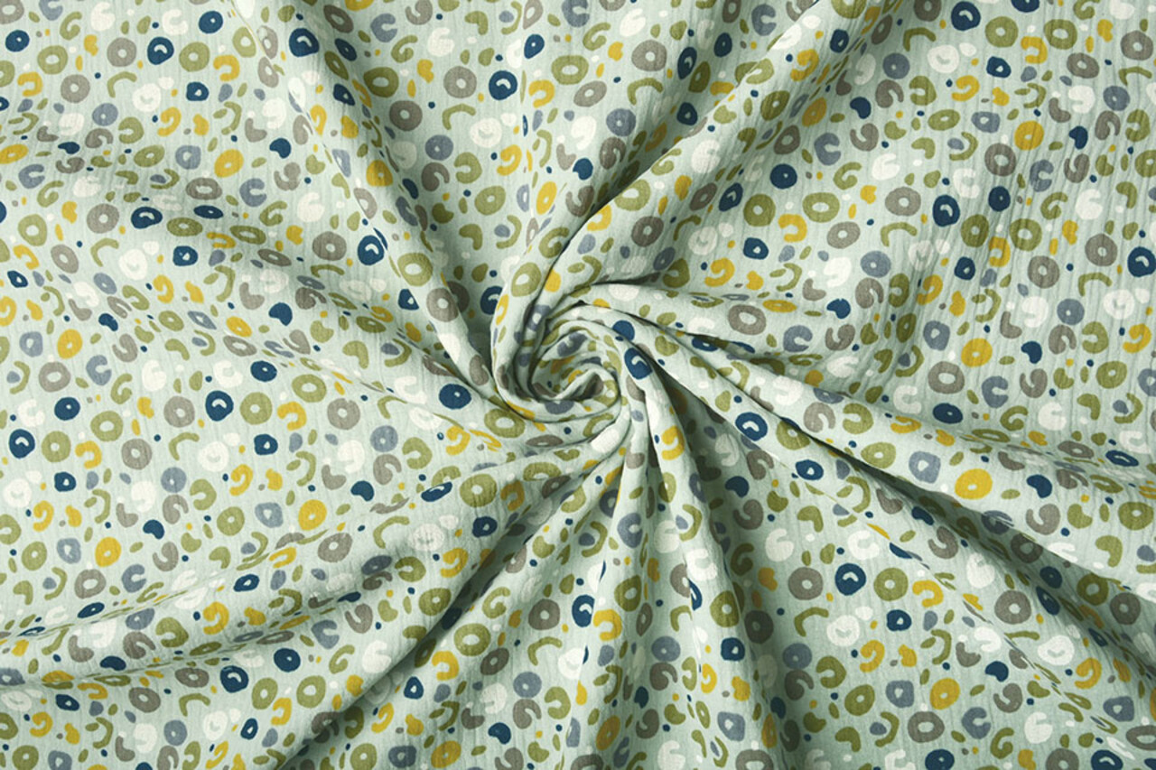 Oeko-Tex® Tessuto di Mussola Leopardo Verde Antico Chiaro Oeko-Tex® Tessuto di Mussola Leopardo Verde Antico Chiaro
