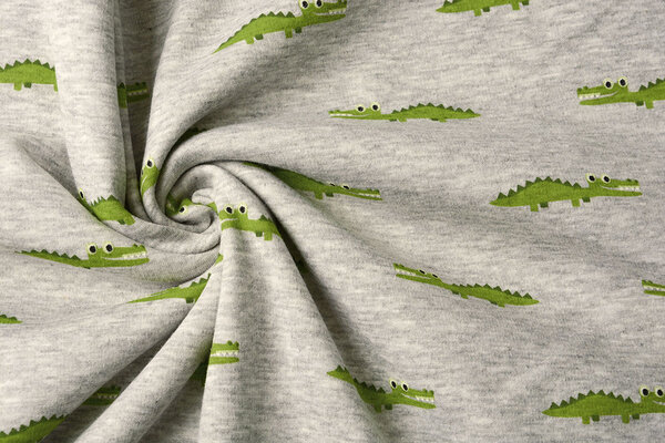 Sweatstoff Alpenfleece Krokodil Grau Melange Sweatstoff Alpenfleece Krokodil Grau Melange