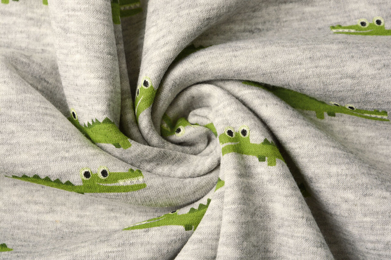 Sweatstoff Alpenfleece Krokodil Grau Melange Sweatstoff Alpenfleece Krokodil Grau Melange