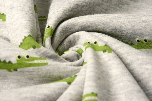 Sweatstoff Alpenfleece Krokodil Grau Melange Sweatstoff Alpenfleece Krokodil Grau Melange