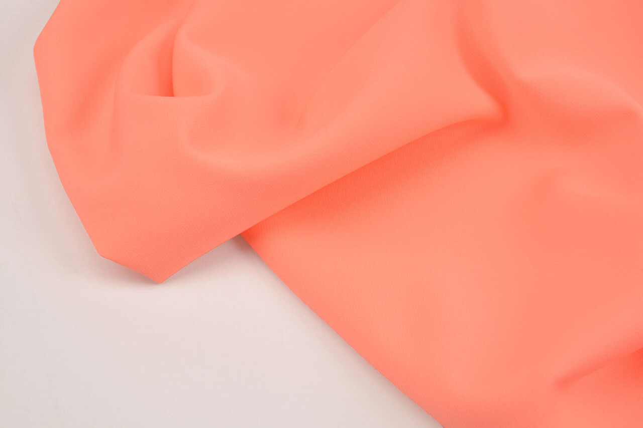 Crêpe Elasticizzato in 2 Direzioni Fluorescente Corallo Crêpe Elasticizzato in 2 Direzioni Fluorescente Corallo