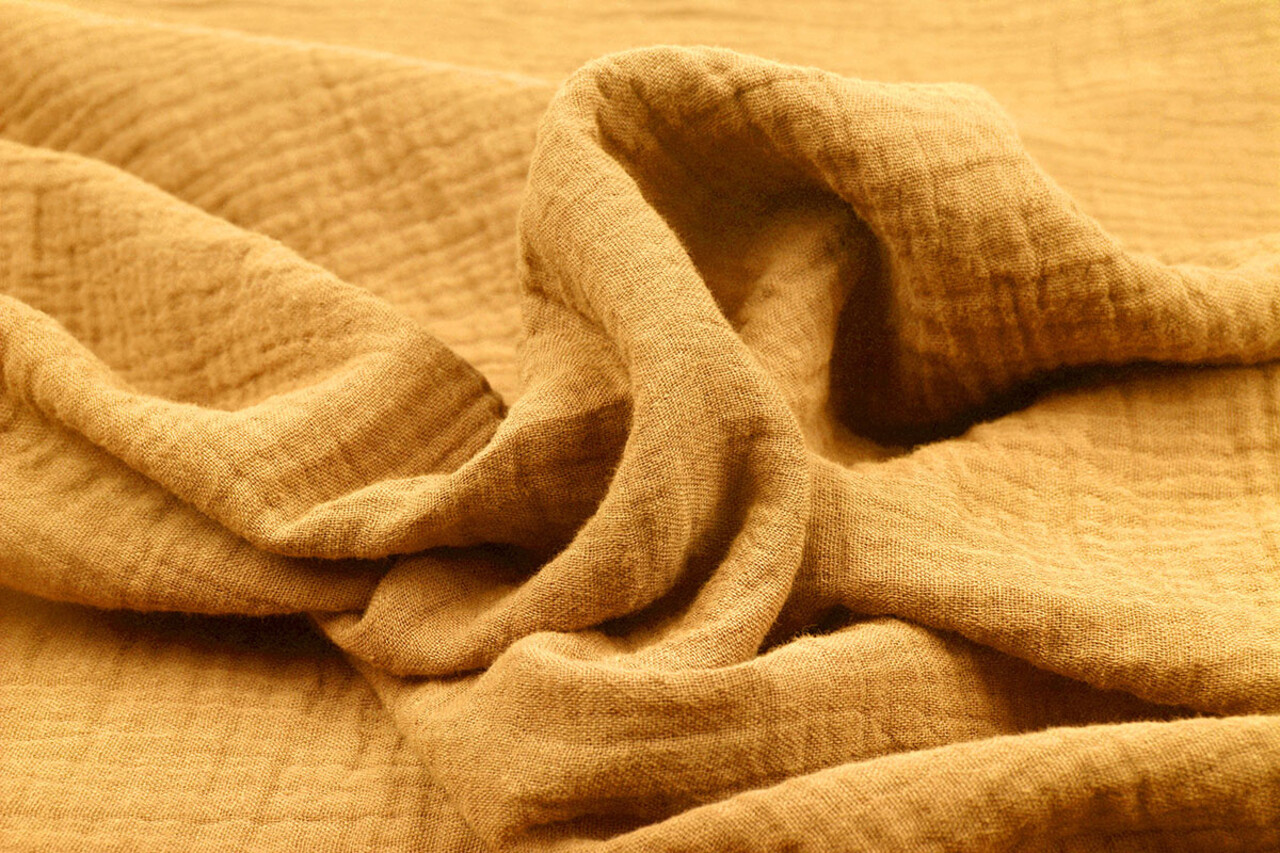 Oeko-Tex® Tessuto di Mussola Giallo Ocra Oeko-Tex® Tessuto di Mussola Giallo Ocra
