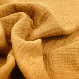 Oeko-Tex® Tessuto di Mussola Giallo Ocra Oeko-Tex® Tessuto di Mussola Giallo Ocra