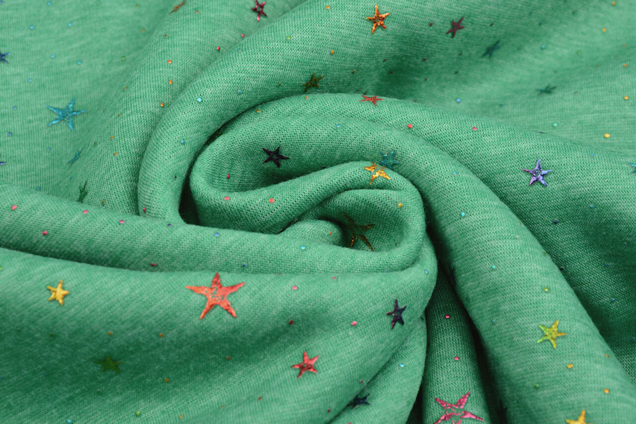 Sweatstoff Alpenfleece Star Drops Foil Grün Melange