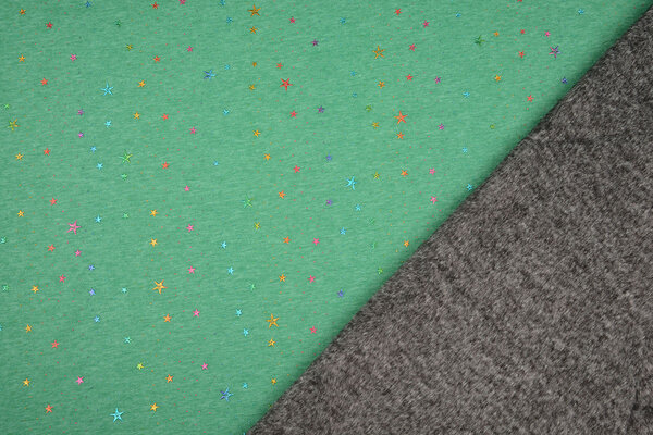 Sweatstoff Alpenfleece Star Drops Foil Grün Melange