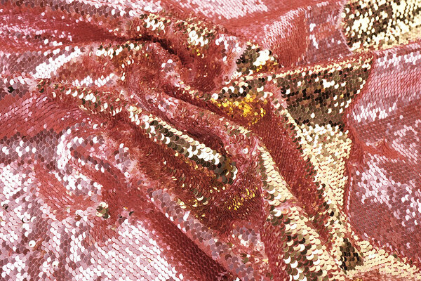 Reversibler Paillettenstoff Rosa-Gold auf Rosa Satin Reversibler Paillettenstoff Rosa-Gold auf Rosa Satin