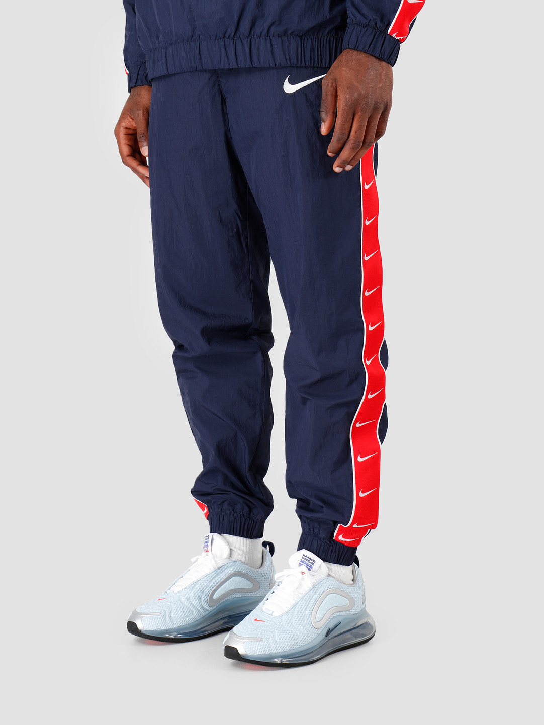 red and blue nike pants