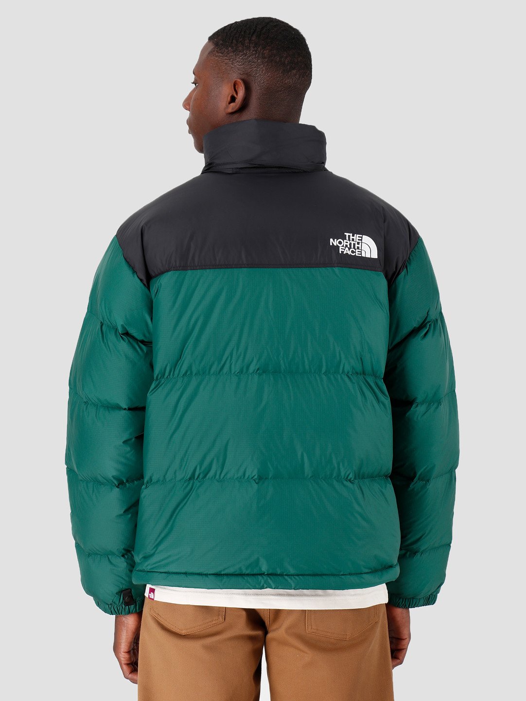 The north face оригинал. The North face 700 Nuptse 1996 Retro зеленый. Пуховик the North face 700 1996 Nuptse Green. The North face Nuptse 700 зеленый. The North face Retro Nuptse 1996 Green.