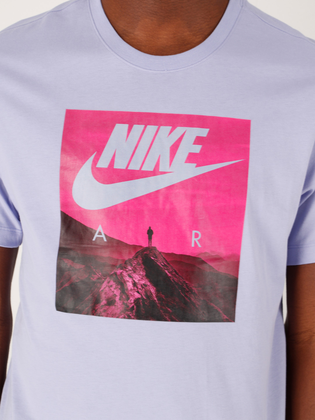 light blue and pink nike shirt