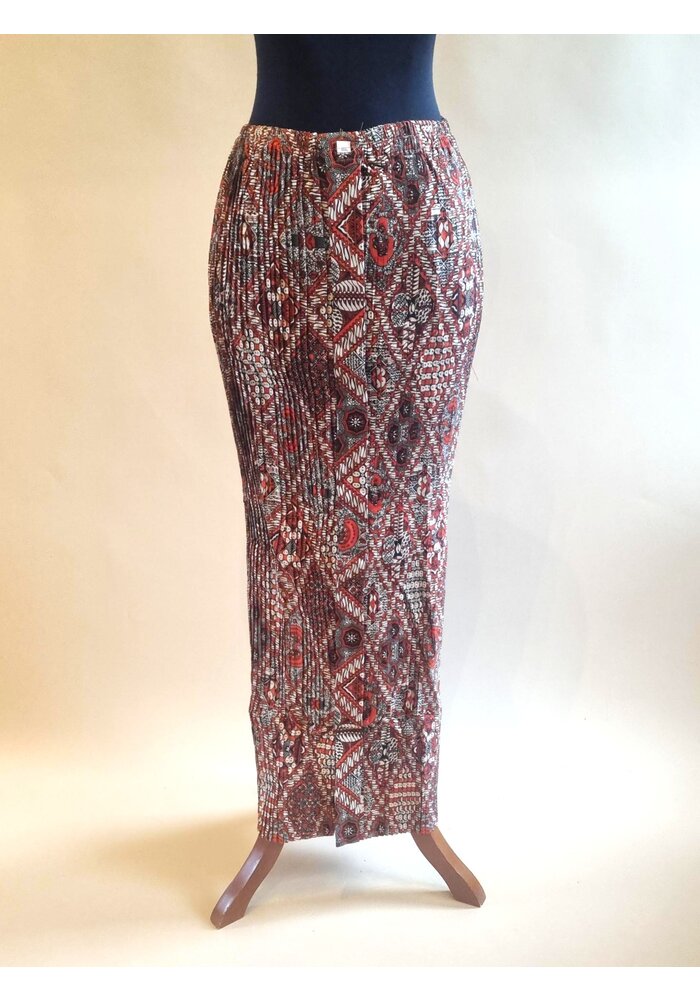 Kebaya klassiek oranje met bijpassende rok plissé