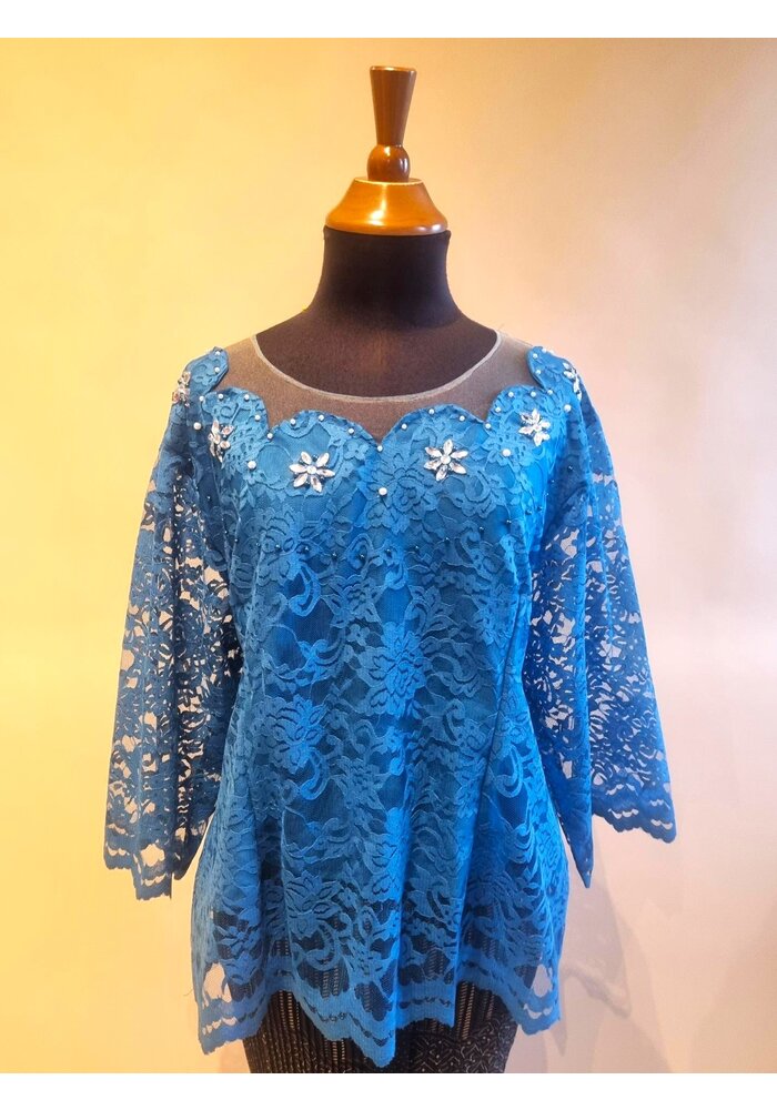 Kebaya modern petrol met bijpassende rok plissé
