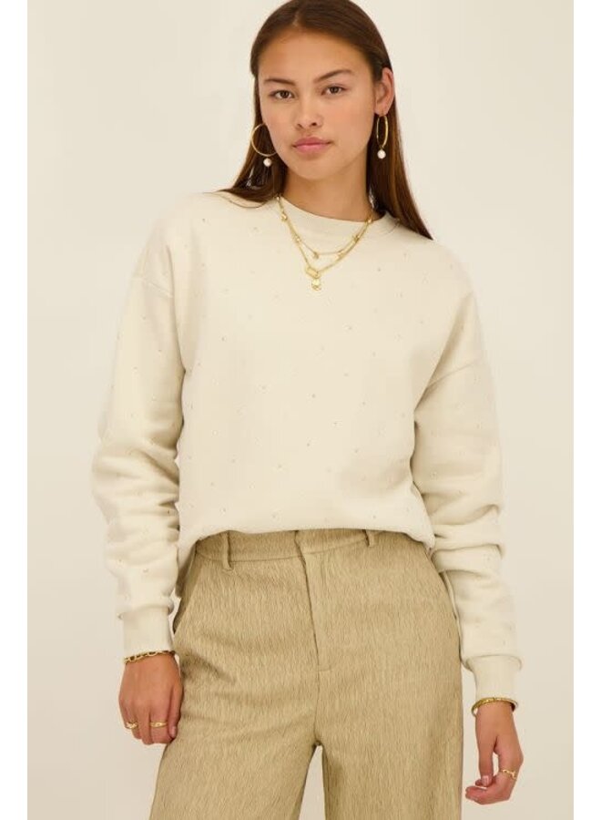 Beige Sweater met all-over studs