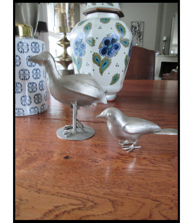 2 ijzeren vogeltjes