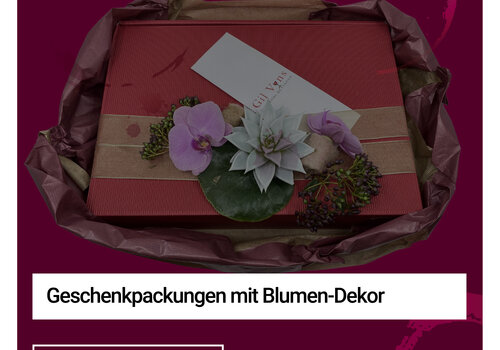 Geschenkpackungen mit Blumen-Dekor