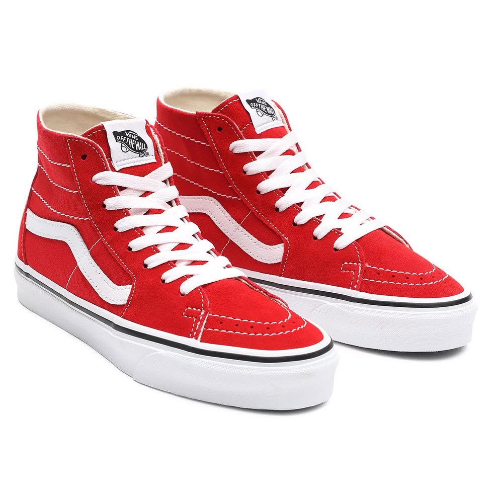 red and white vans with words