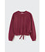 Velour knit bow sweatshirt