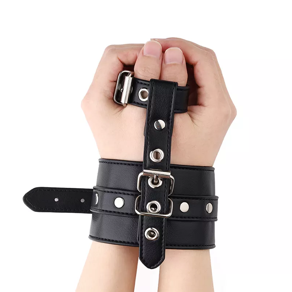 Single Handcuff & Thumb Lock made of PU leather – Hands rendered useless