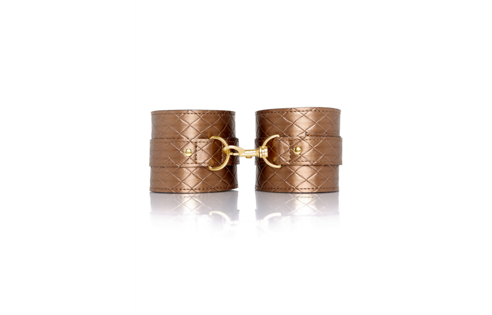Stylish Padded Ankle Cuffs With Gold Details | Xplay