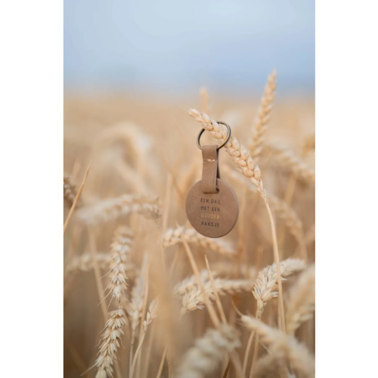 Zusss Zusss | Ronde sleutelhanger gouden randje