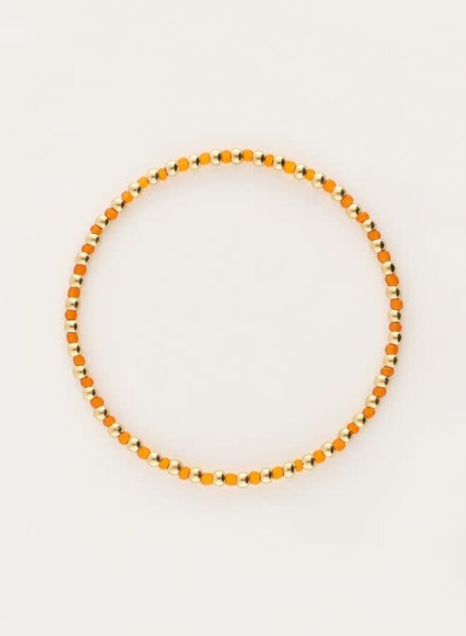 Ocean elastieken armband en kraaltjes oranje