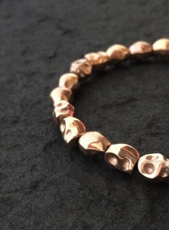 Skulls-in-line |  rosé-gold-plated  | 6x8 mm