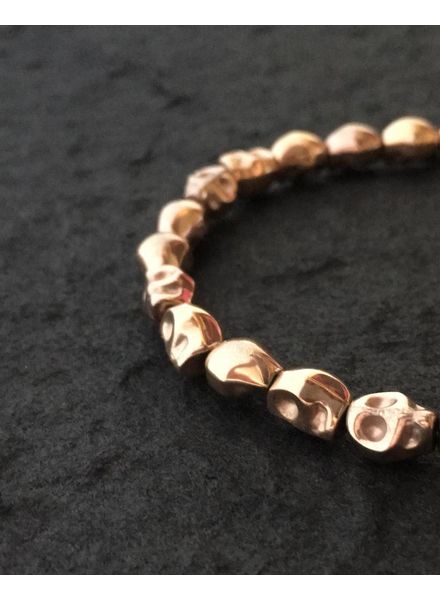 Skulls-in-line |  rosé-gold-plated  | 6x8 mm