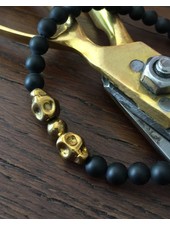 Onyx - matt - schwarz - 6 mm  - Skulls - goldfarben