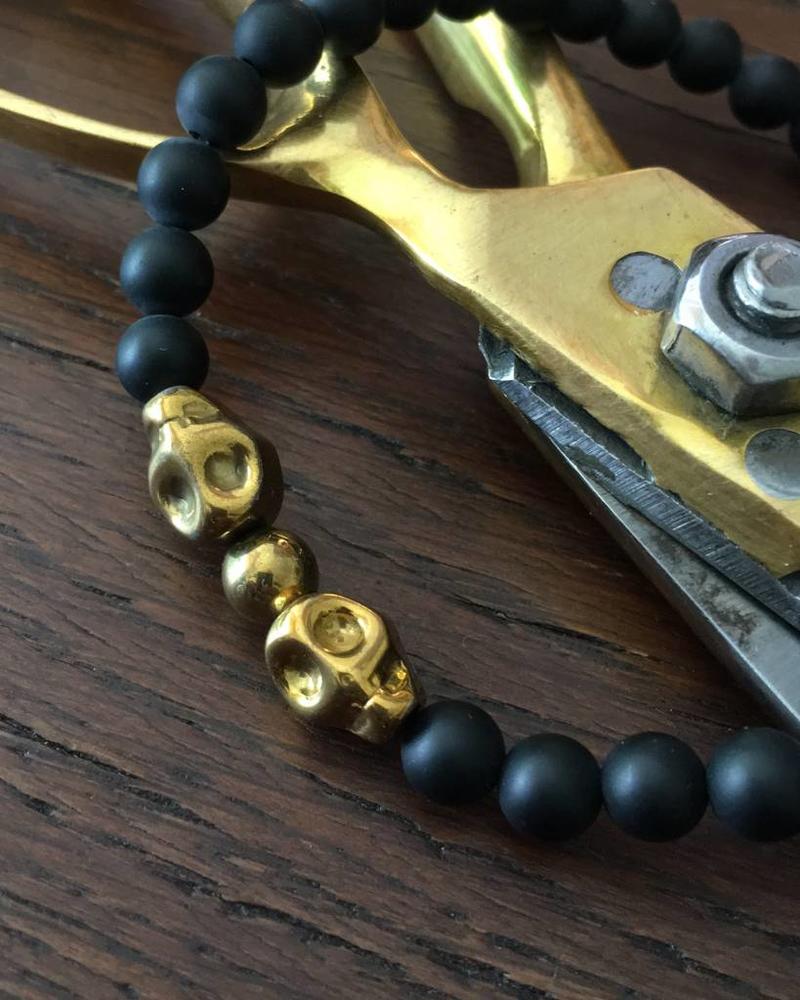 Onyx - matt - black - 6 mm - skulls - gold coloured