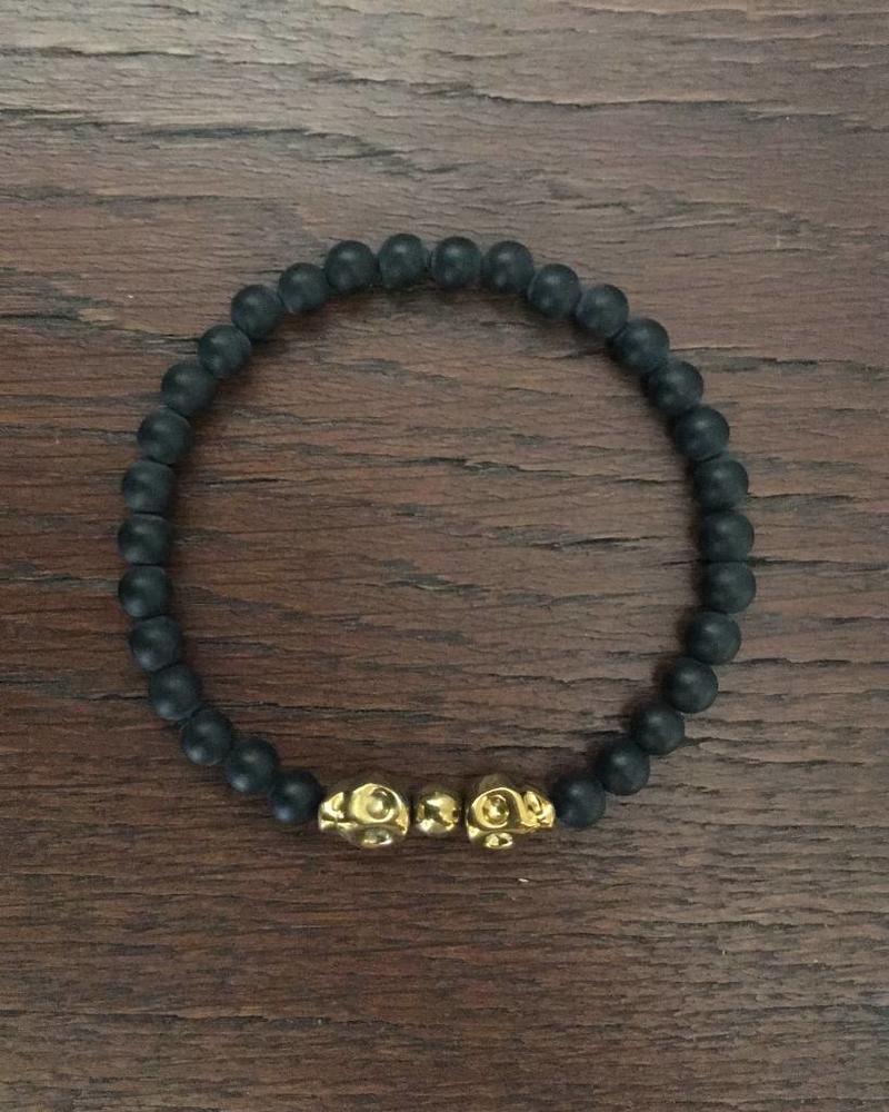 Onyx - matt - black - 6 mm - skulls - gold coloured